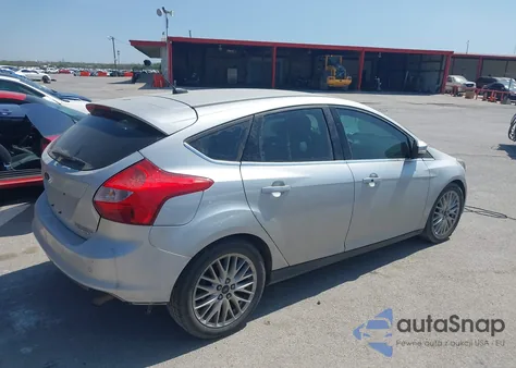 2014 Ford Focus Titanium from USA, damaged, VIN 1FADP3N22EL253809